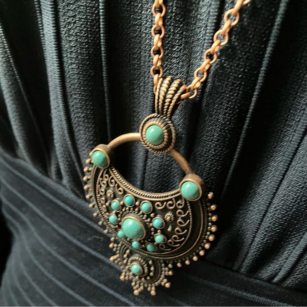 Turquoise and copper metal pendant necklace
